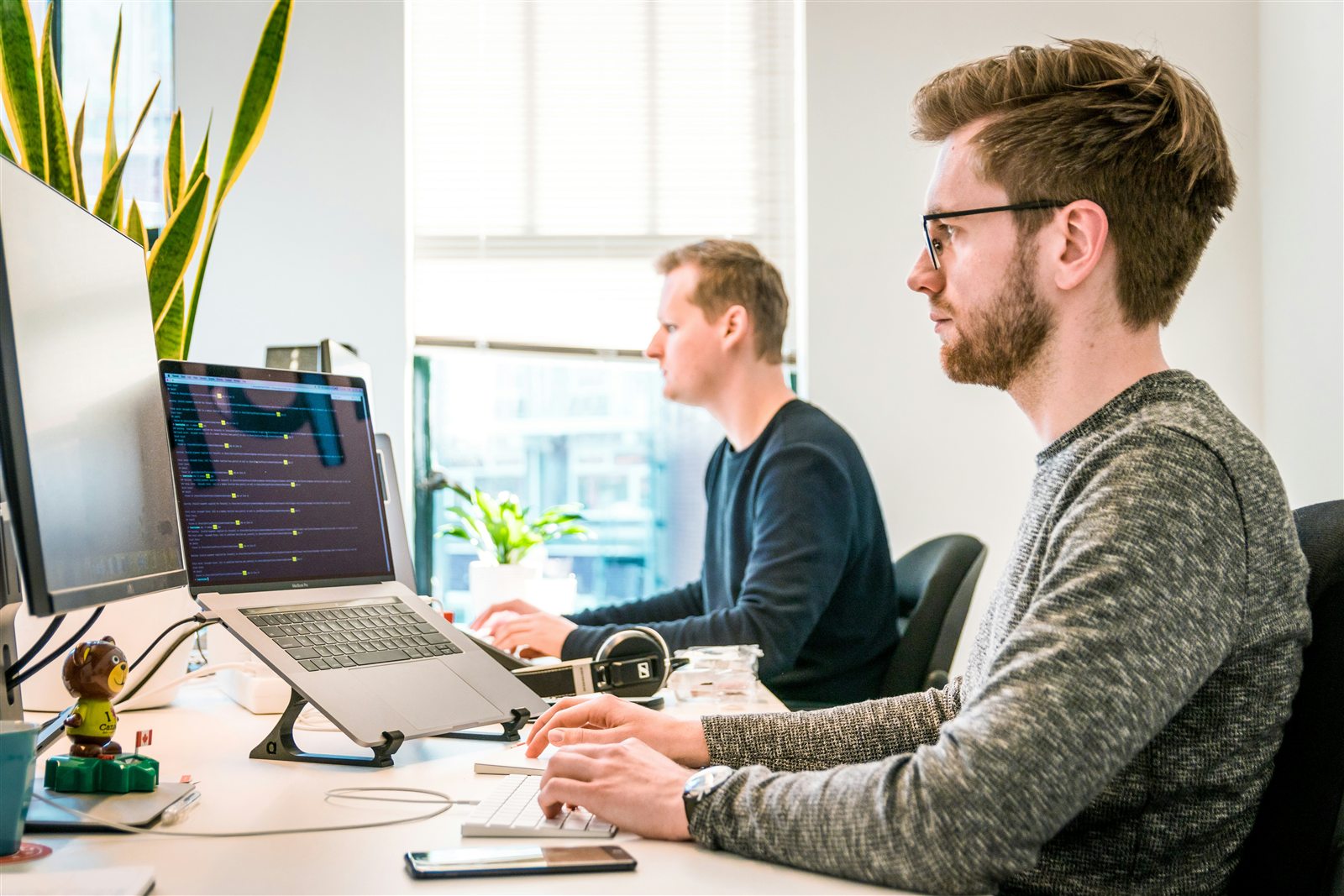IT consulting workspace with laptop and business technology planning